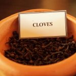 Herbal Demonstration cloves in a clay bowl